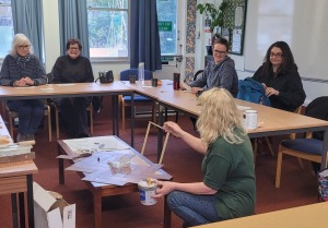 Carol showing some furniture upcycling techniques